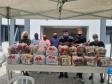 Cestas doadas no “Dia de Solidariedade” são entregues em vilas de Curitiba e Região Metropolitana
