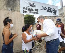 Secretaria da Justiça, Cufa, Defesa Civil e Família Solidária entregam cestas básicas para 600 famílias da Vila Torres e comunidade Tiradentes  Com a intenção de minimizar os impactos sociais do coronavírus em famílias que estão na situação de vulnerabilidade social das comunidades Vila Torres e Nova Tiradentes, a rede de voluntários ‘Família Solidária’ da Secretaria da Justiça, Família e Trabalho, a Central Única das Favelas (Cufa) e Defesa Civil entregaram nesta sexta-feira (18) cestas básicas para mais d